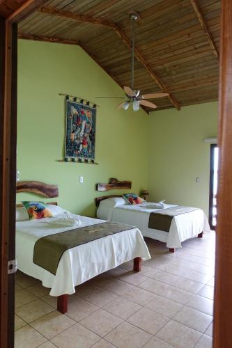 Foto de una habitación de Hotel Bahia Taitza