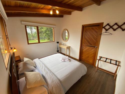 Foto de una habitación de Hosteria Papagayo Cotopaxi
