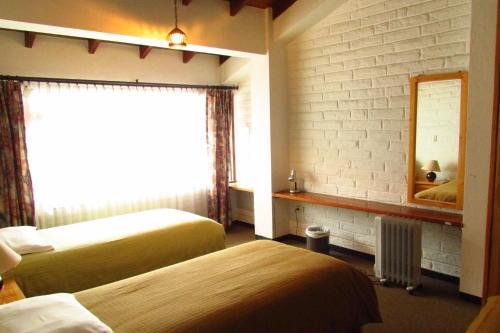 Foto de una habitación de Apartamentos Los Quipus