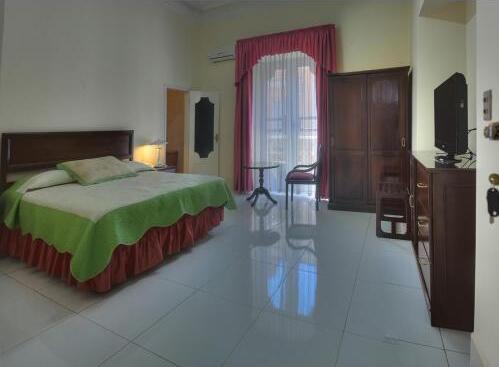 Foto de una habitación de Luz Palace Hotel