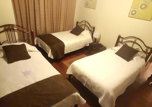 Foto de una habitación de La Merced Plaza Hostal