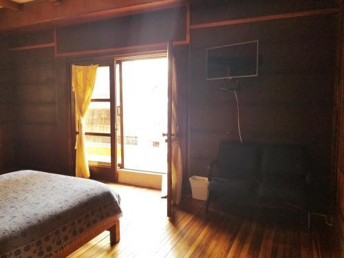 Foto de una habitación de Albergue Travellers Inn