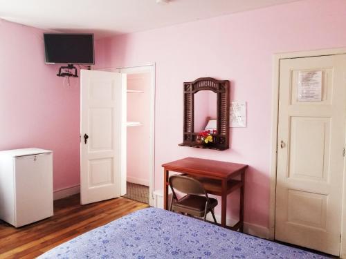 Foto de una habitación de Albergue Travellers Inn