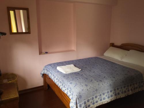 Foto de una habitación de Albergue Travellers Inn
