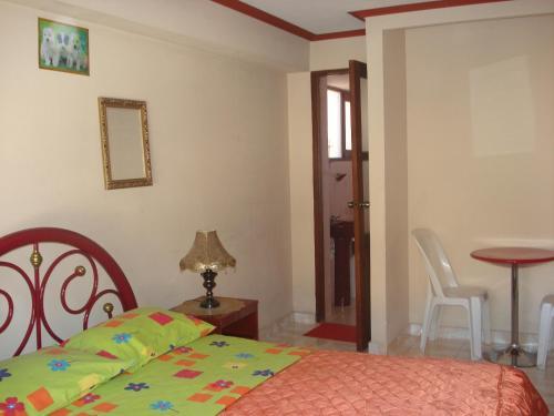 Foto de una habitación de Hostal Olympic