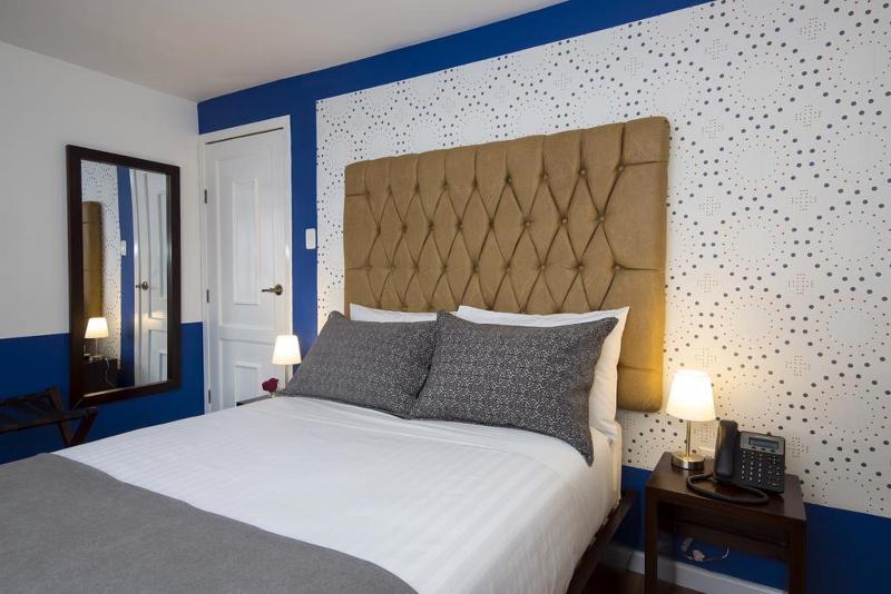 Foto de una habitación de TERRA PREMIUM Hostal Boutique