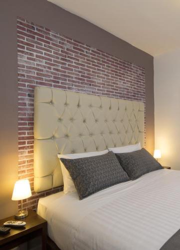 Foto de una habitación de TERRA PREMIUM Hostal Boutique