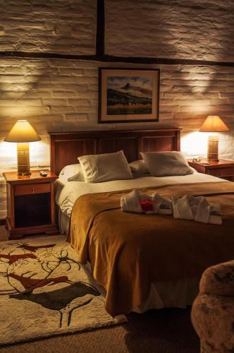 Foto de una habitación de Hotel Hacienda Abraspungo