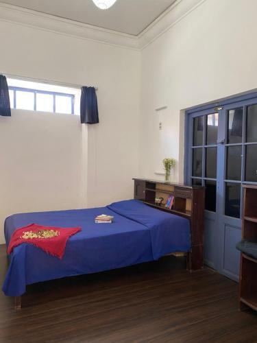 Foto de una habitación de Casa Blanca Hostel