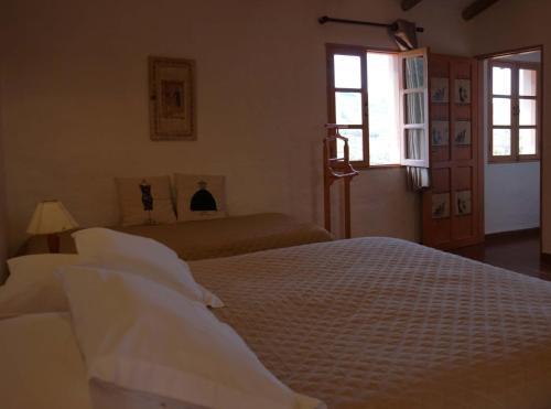 Foto de una habitación de El Pueblito Hotel Boutique