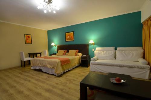 Foto de una habitación de Alto Verde Suite &amp;amp; Apart