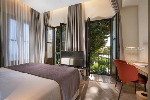 Foto de una habitación de Suites Murillo Plaza Sta. Cruz