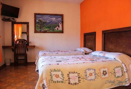 Foto de una habitación de Hotel Real de la Montaña