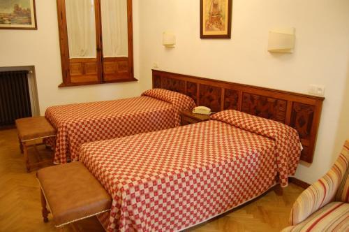 Foto de una habitación de Hospederia del Real Monasterio