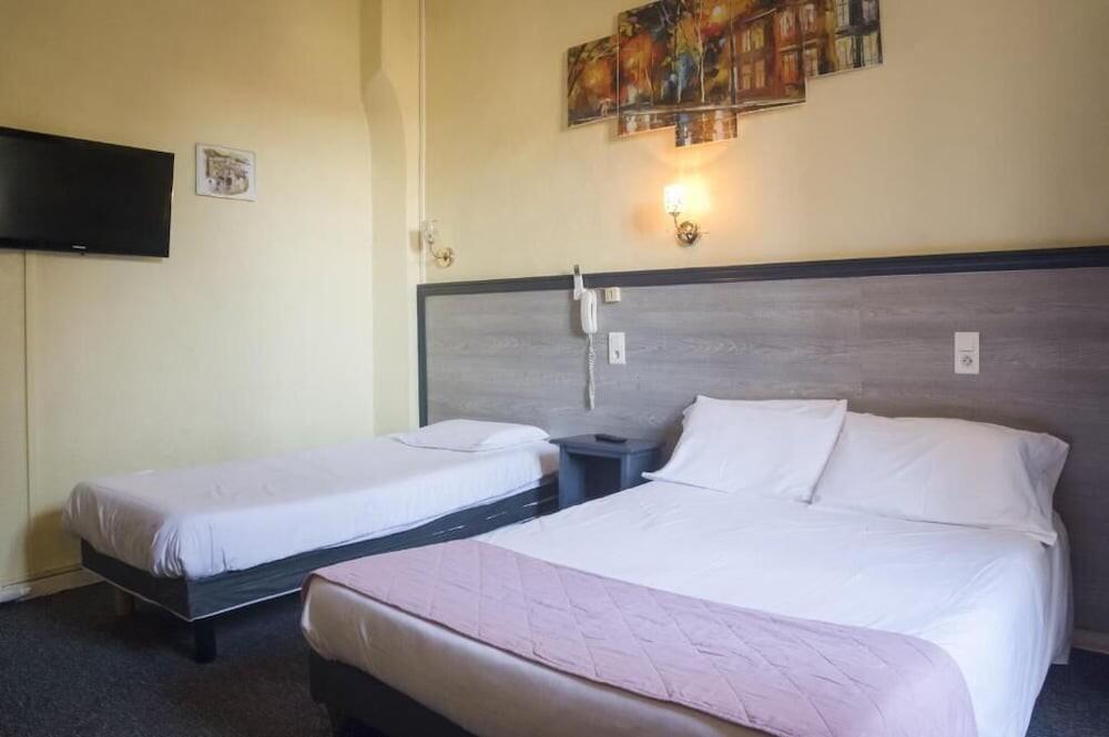 Foto de una habitación de Citotel Hôtel Cesar