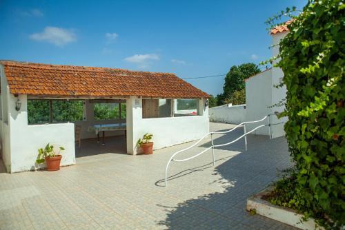 Foto de una habitación de Apartamentos F - Quinta das Alagoas
