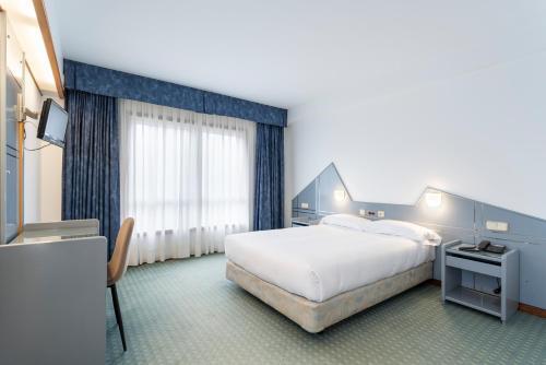 Foto de una habitación de Hotel Costa Atlántica