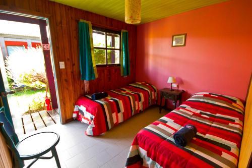 Foto de una habitación de Lago Argentino Hostel