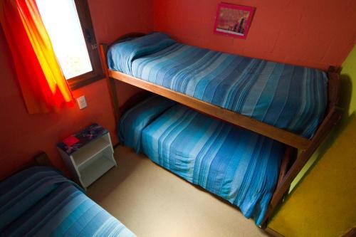Foto de una habitación de Lago Argentino Hostel