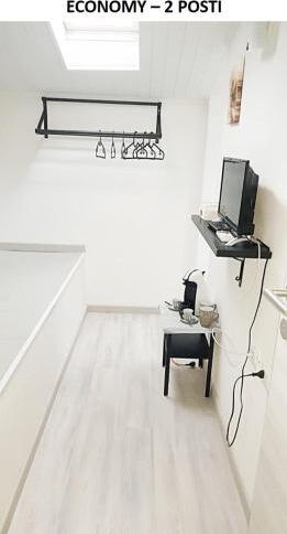 Foto de una habitación de DOMY&amp;#039;S GUEST HOUSE