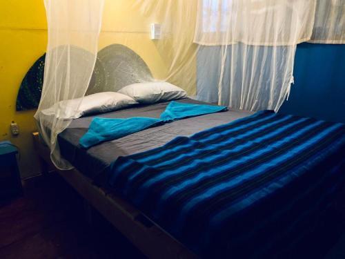 Foto de una habitación de Hotel La Casa Rosada