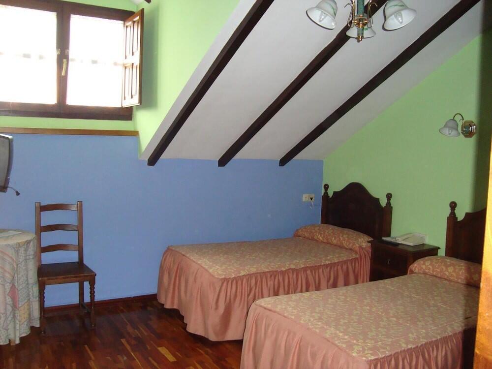 Foto de una habitación de Hosteria Peña Sagra