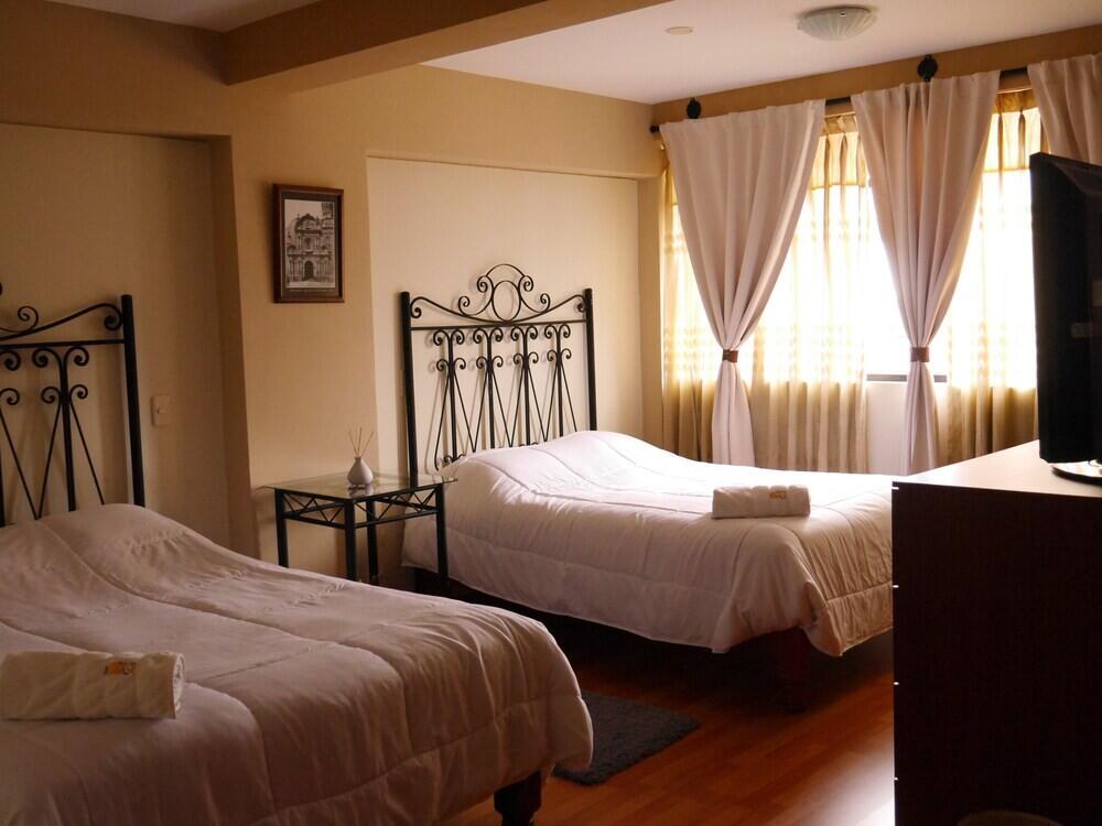 Foto de una habitación de Hotel La Mansion Del Sol