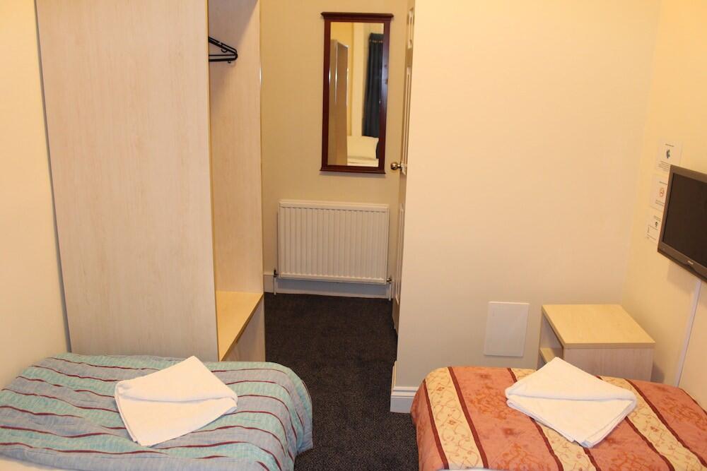 Foto de una habitación de Belgrave House Hotel