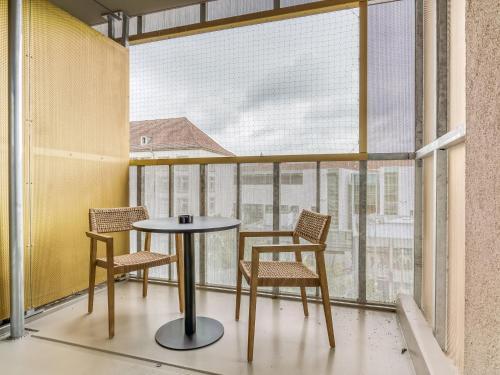Foto de una habitación de Apartamentos limehome Dresden Wallstraße