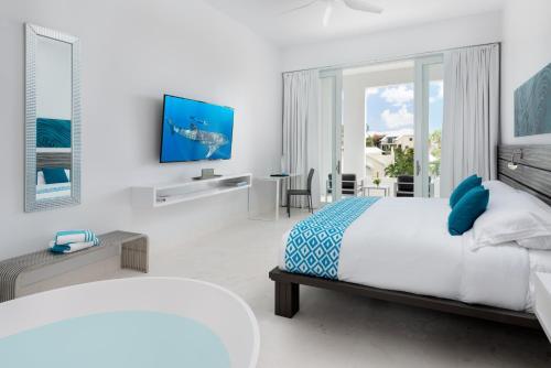 Foto de una habitación de Zenza Boutique Hotel