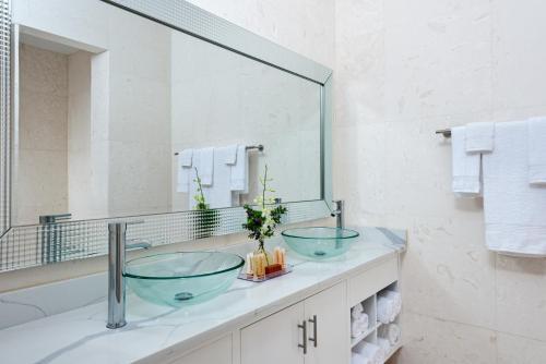 Foto del baño de Zenza Boutique Hotel