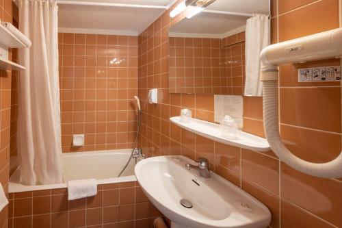 Foto de una habitación de Hôtel du Soleil Levant