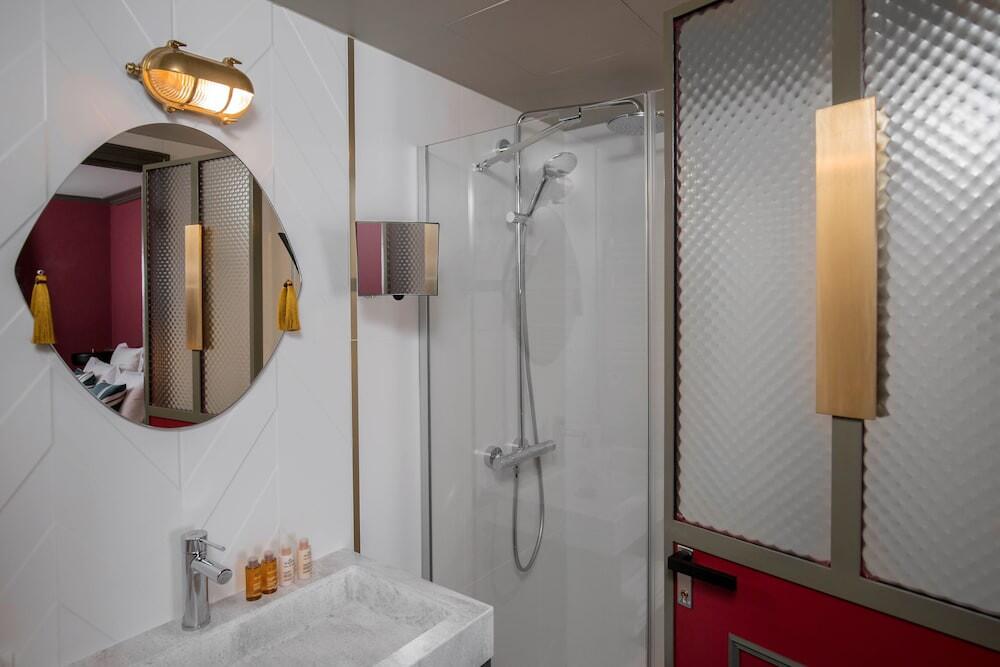 Foto del baño de Hôtel Louvre Piemont
