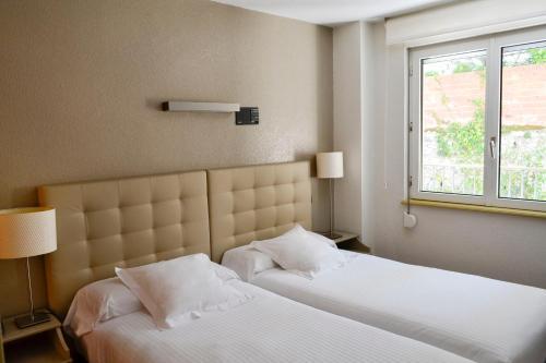 Foto de una habitación de Hotel Apartamentos Don Carlos