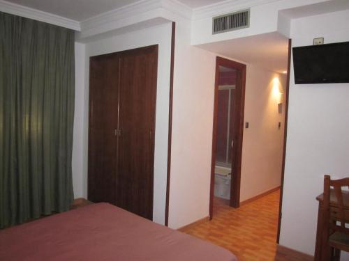 Foto de una habitación de Hotel Elena María