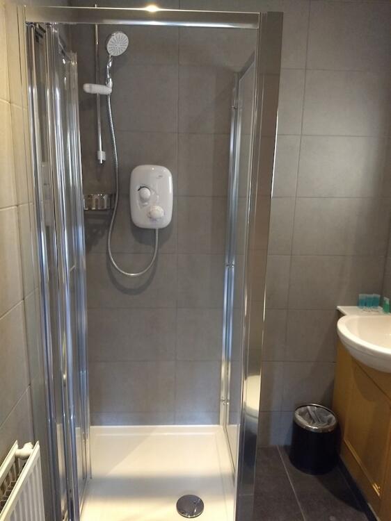 Foto del baño de Garden Court Hotel