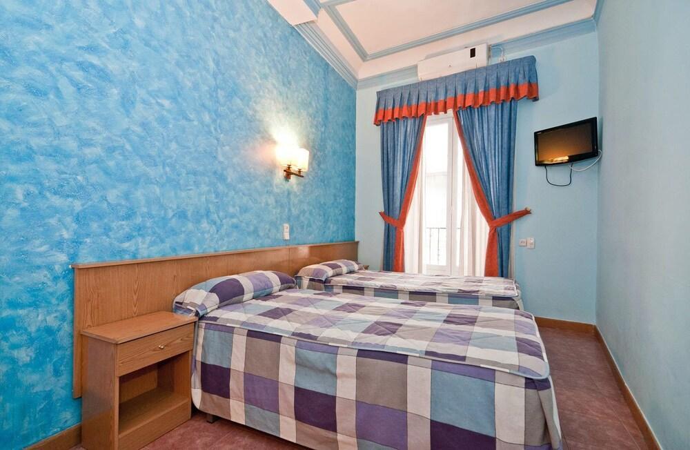 Foto de una habitación de Hostal Oporto