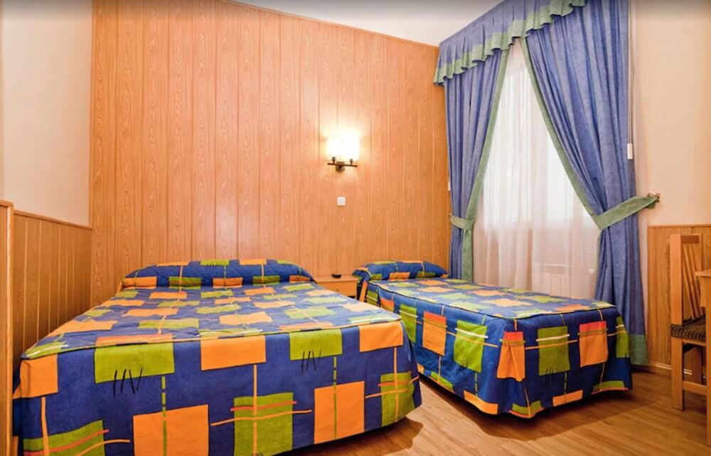 Foto de una habitación de Hostal Oporto