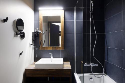 Foto del baño de Appart&amp;#039;Hôtel Prestige Odalys L&amp;#039;Eclose