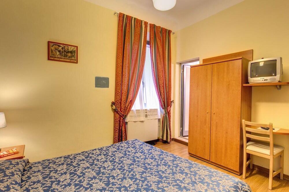 Foto de una habitación de Hotel Romagna