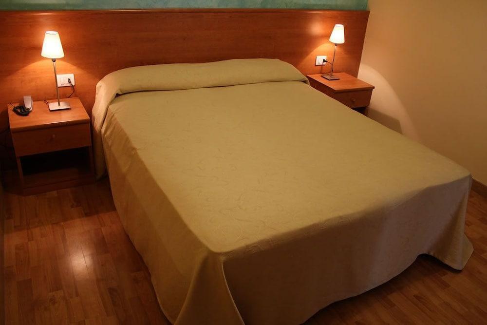 Foto de una habitación de Hotel Romagna