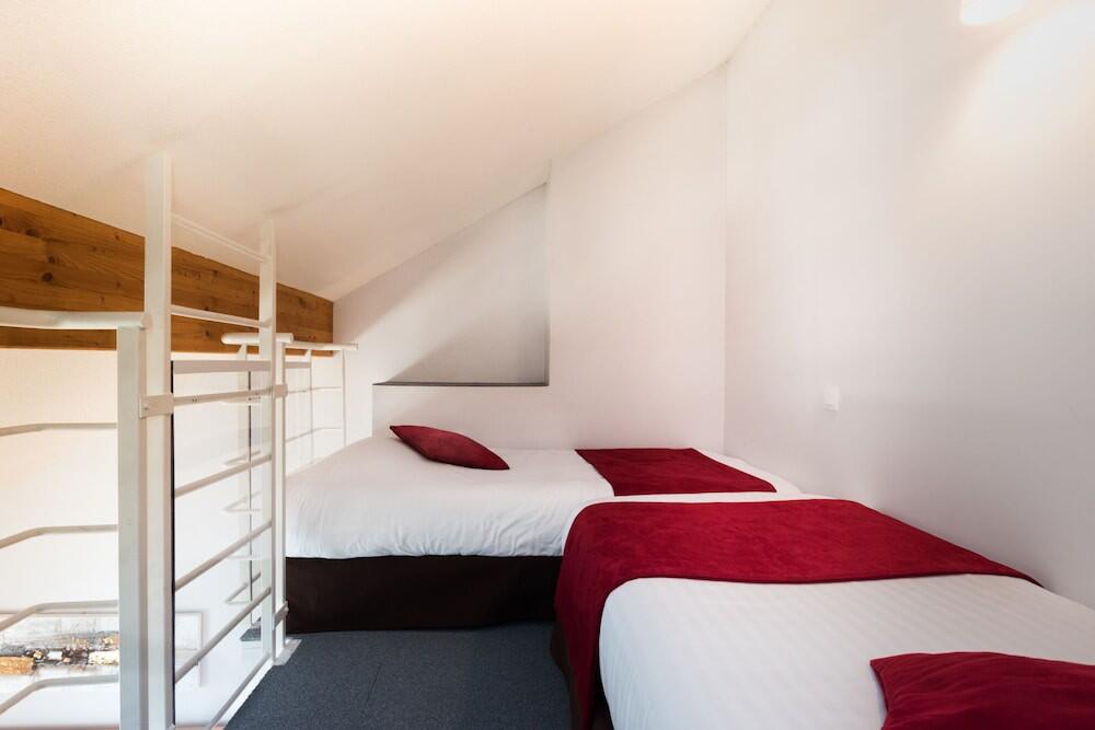 Foto de una habitación de Carré Py&amp;#039; Hôtel