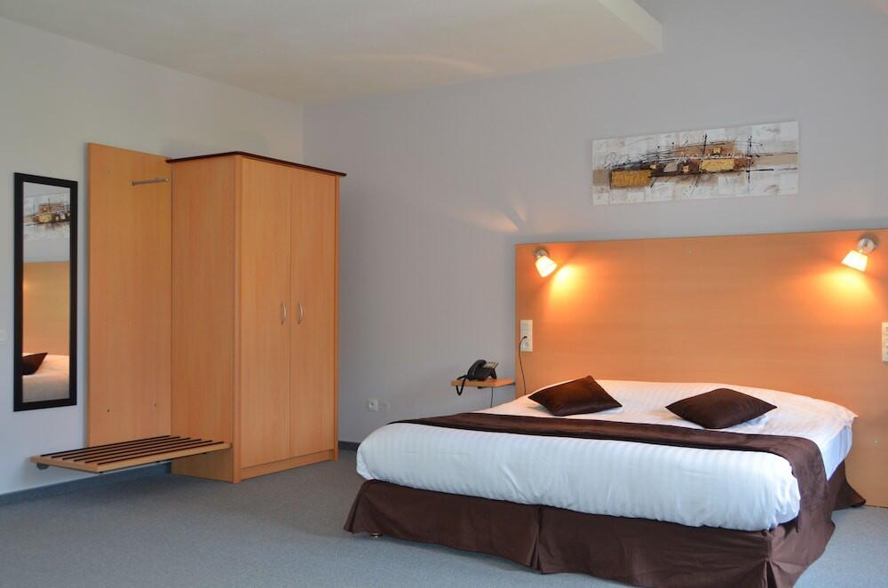 Foto de una habitación de Carré Py&amp;#039; Hôtel