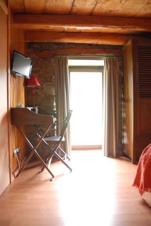 Foto de una habitación de Hotel Masia d&amp;#039;en Valentí