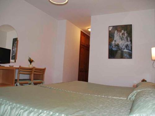 Foto de una habitación de Hotel Saloria
