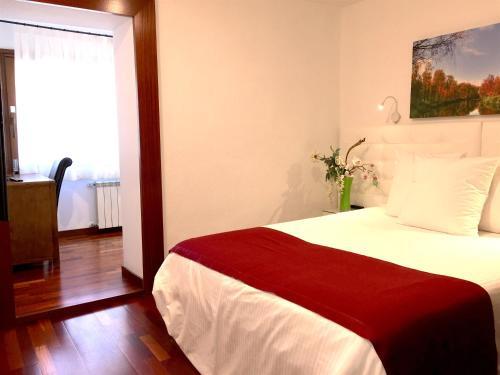 Foto de una habitación de Hotel Del Lago