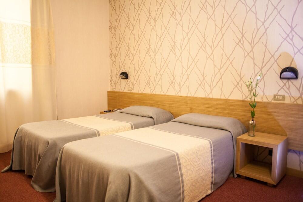 Foto de una habitación de Hotel Italia