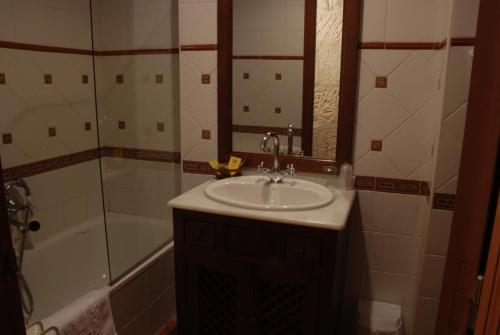 Foto del baño de Hotel O Portelo Rural
