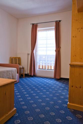 Foto de una habitación de Hotel Garnì Nès Crépes