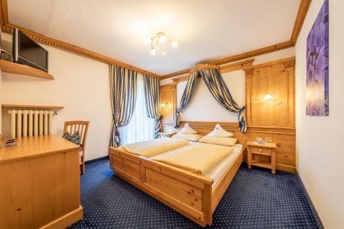 Foto de una habitación de Hotel Dolomiti